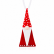 A red and white gnome-shaped hanging ornament with white polka dots on the hat, a white beard, and a small pearl-like nose, suspended by a white ribbon on a white background.